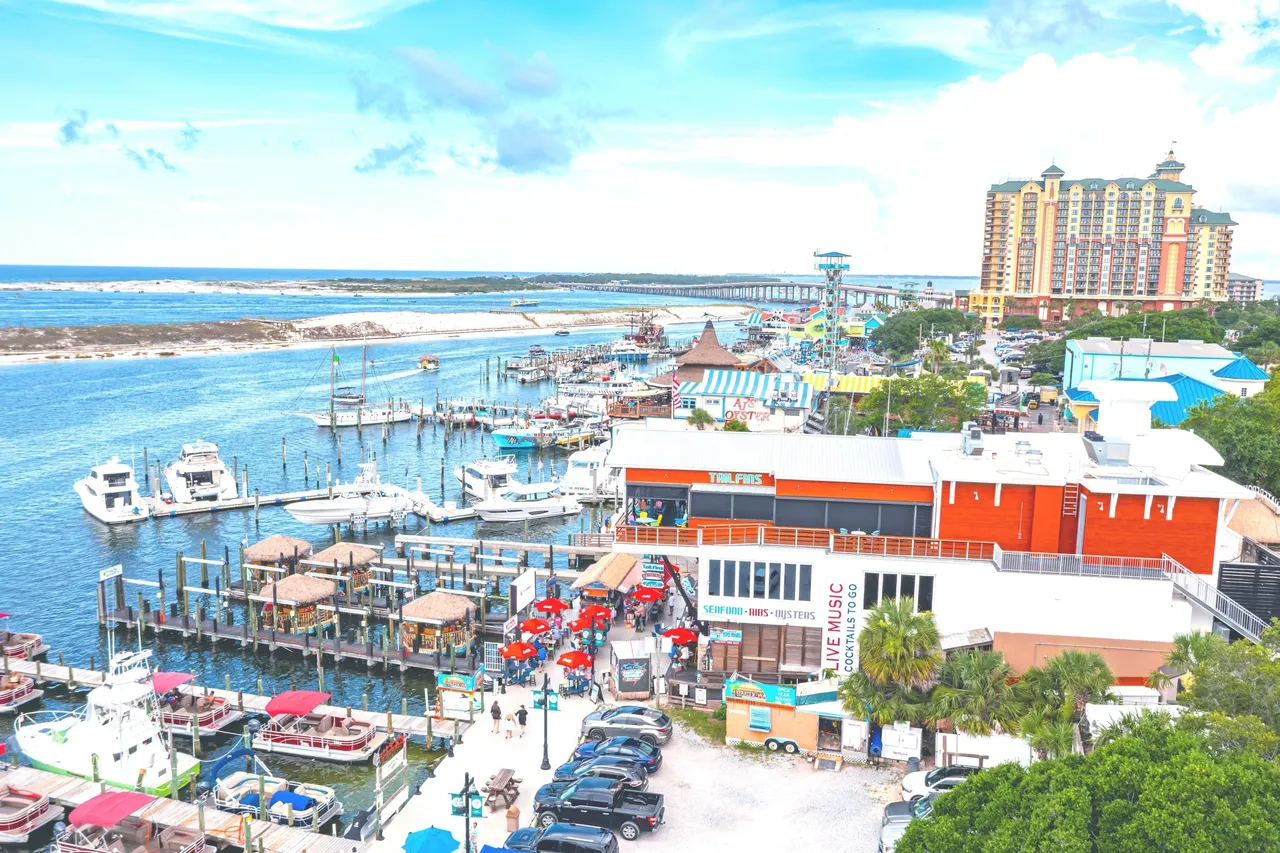 Coastal cityscape with boats and skyline