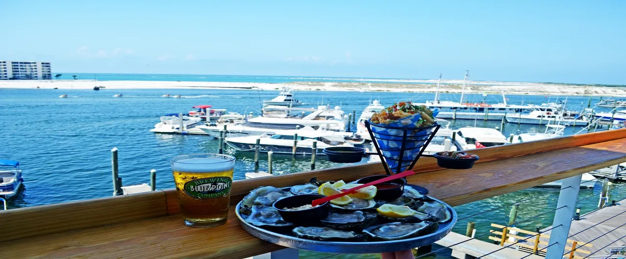 Waterfront meal overlooking boats and water