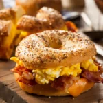 Bagel sandwich with eggs and bacon