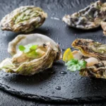 Fresh oysters on a slate plate