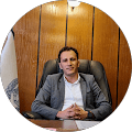 Businessman in suit at desk