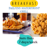 Golden waffles topped with crispy fried chicken
