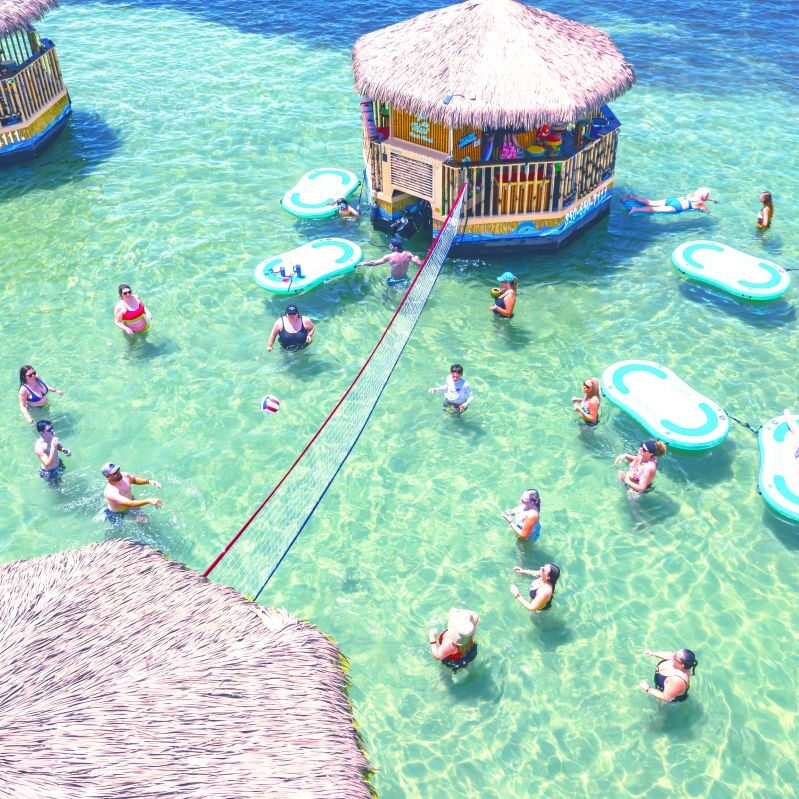 Aerial view of floating tiki huts